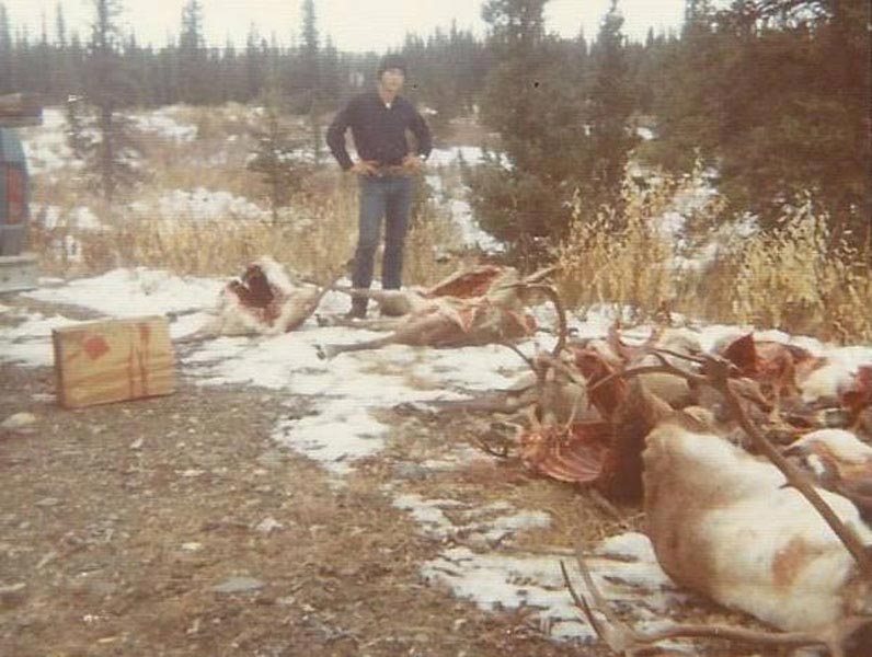 old photo of a hunt camp site