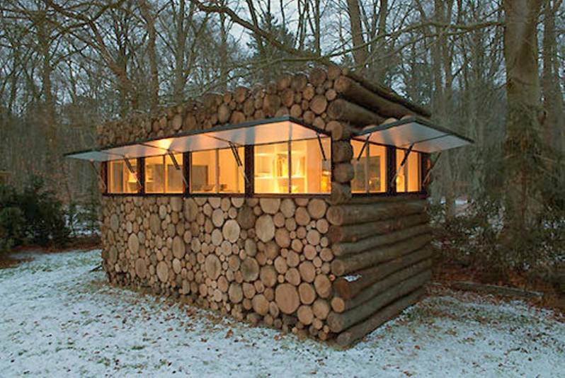 A wood blind with sliding windows.