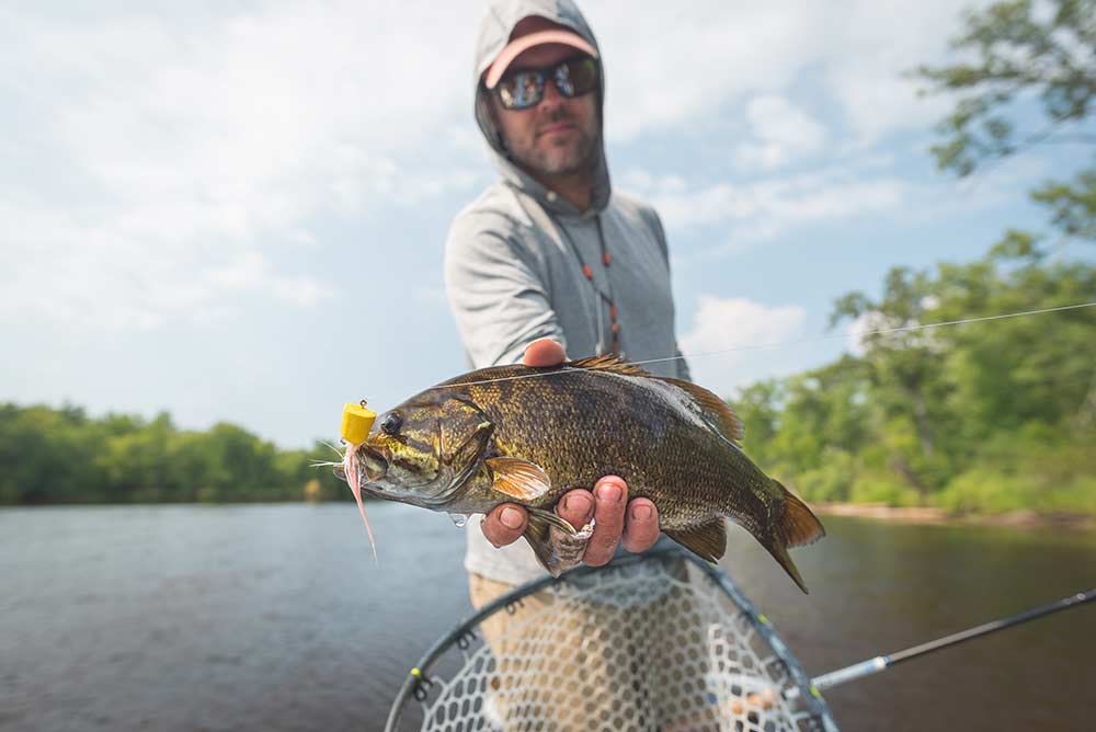 smallmouth bass caught with popper lure