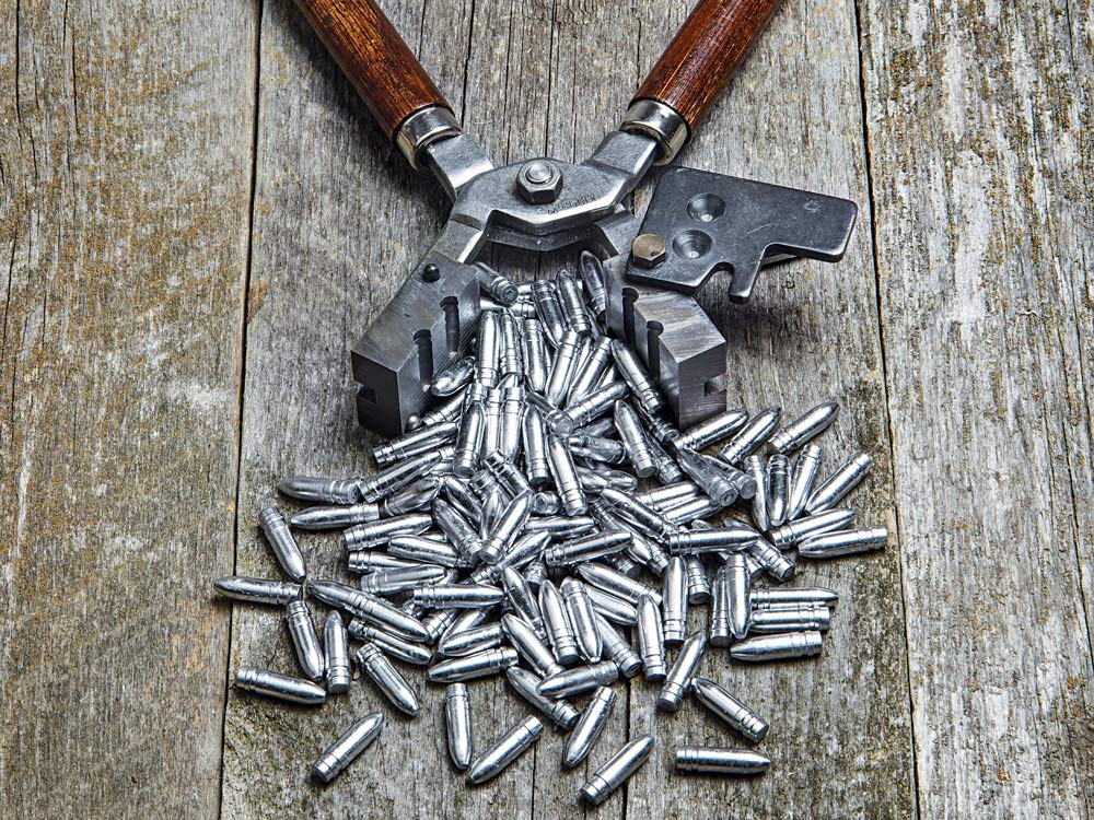 pile of 7mm rifle bullets freshly cast