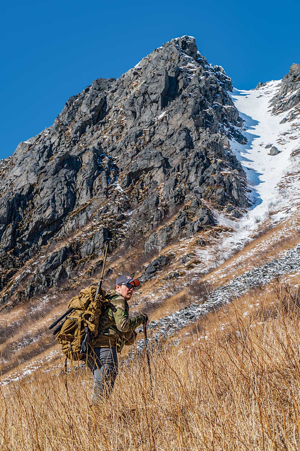 long hunter hiking kodiak island for goat hunting