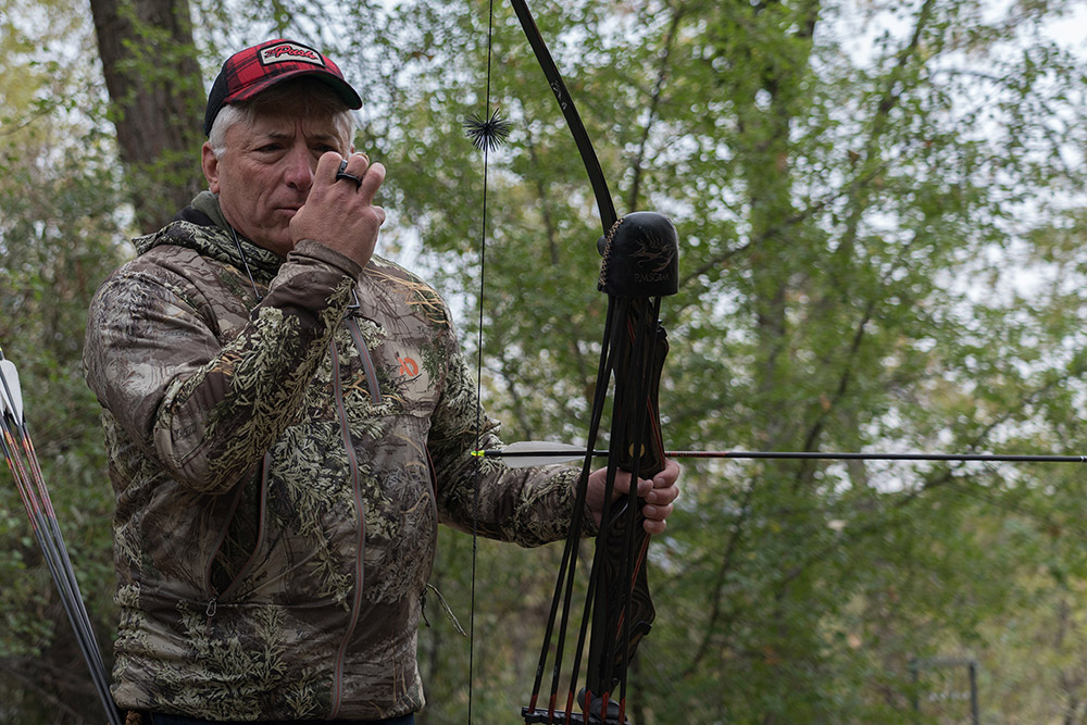 traditional bowhunter out in the woods