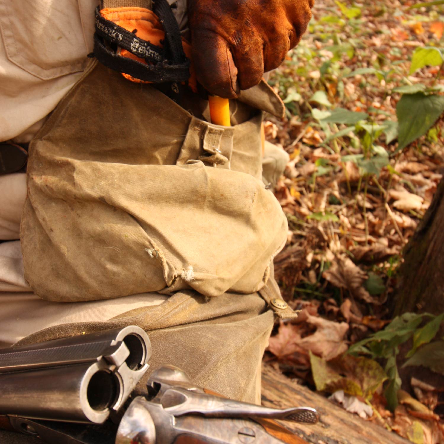 hunter changing ammo in a shotgun