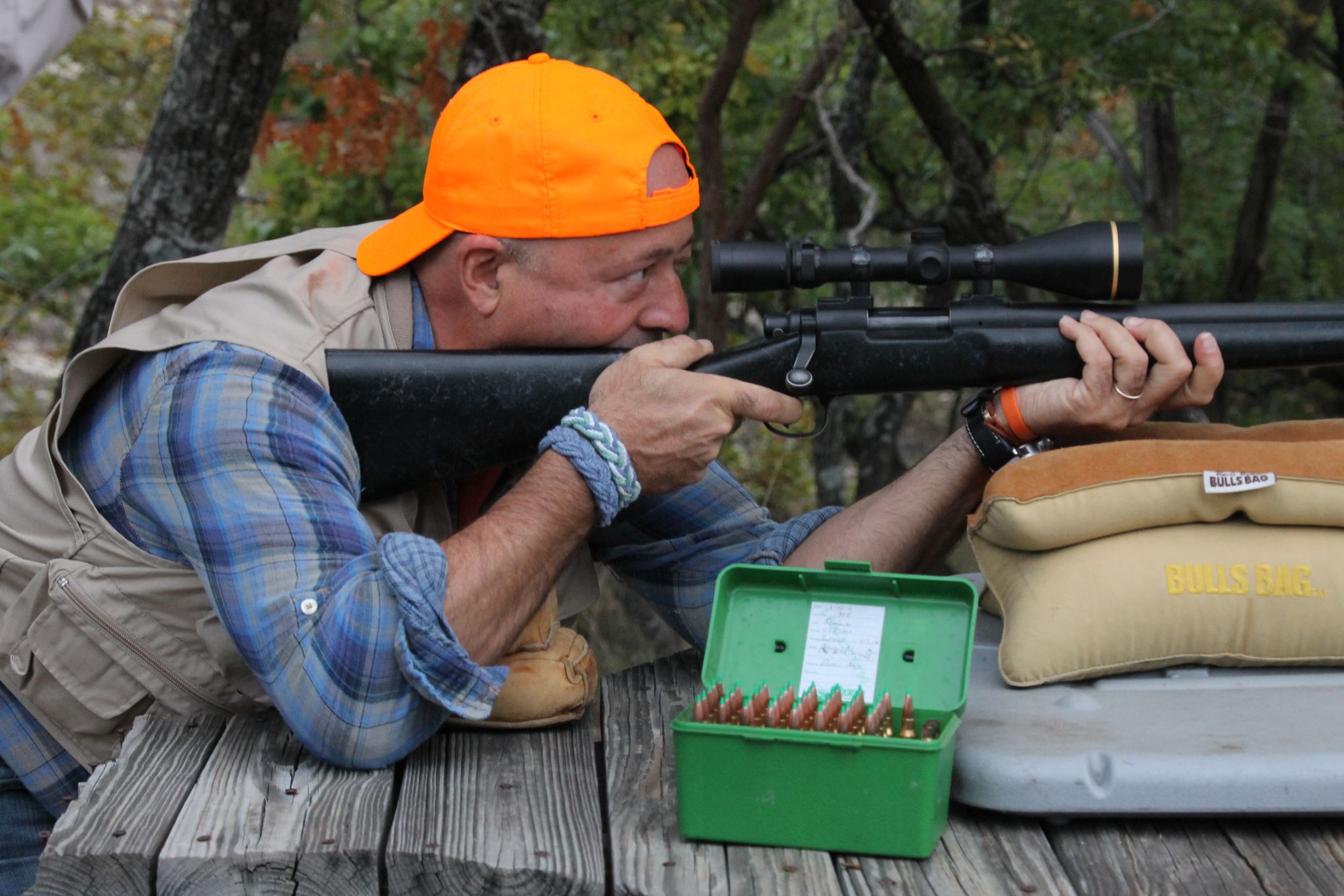 Andrew Zimmern practices from the bench.