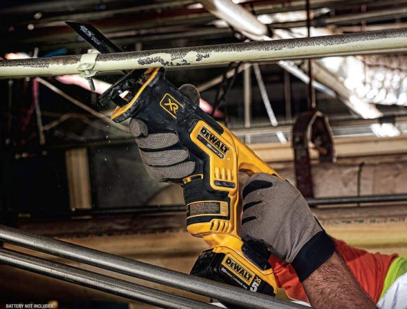 Man using a Dewalt reciprocating saw