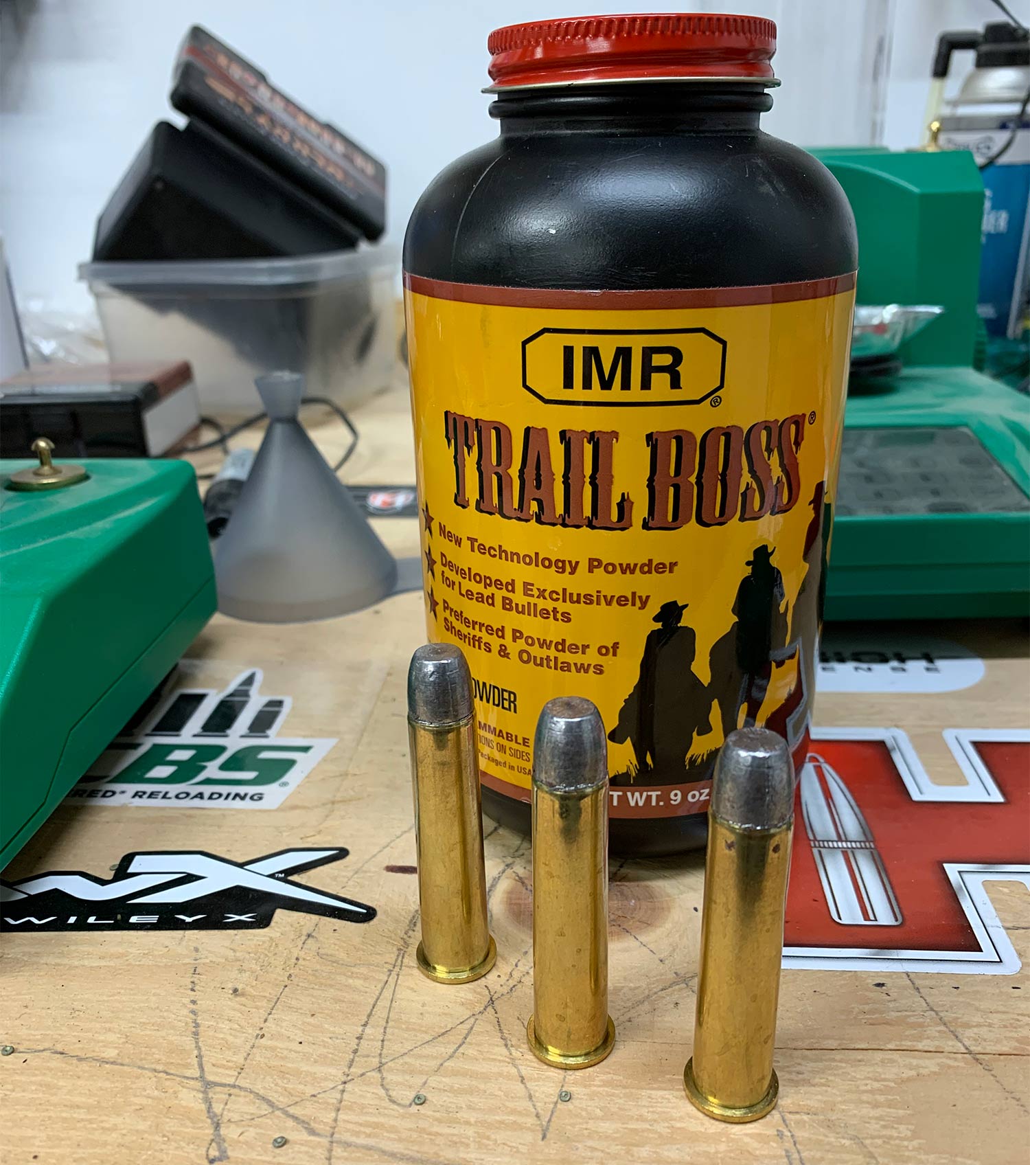 Trail boss gunpowder and handloaded rounds.