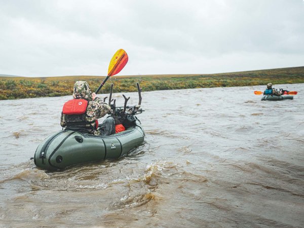 Hunters floating on the Sagavanirktok river.