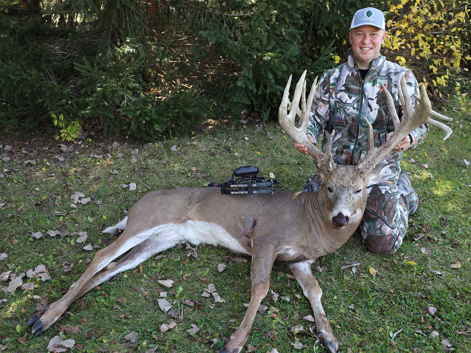 A hunter holds a whitetail deer antler.