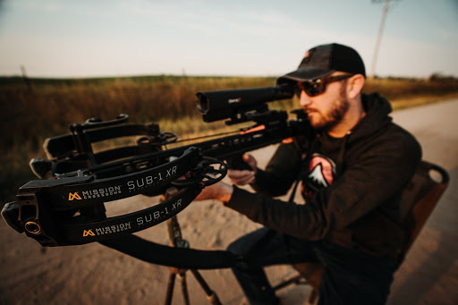 Man shooting Mission Sub-1 crossbow