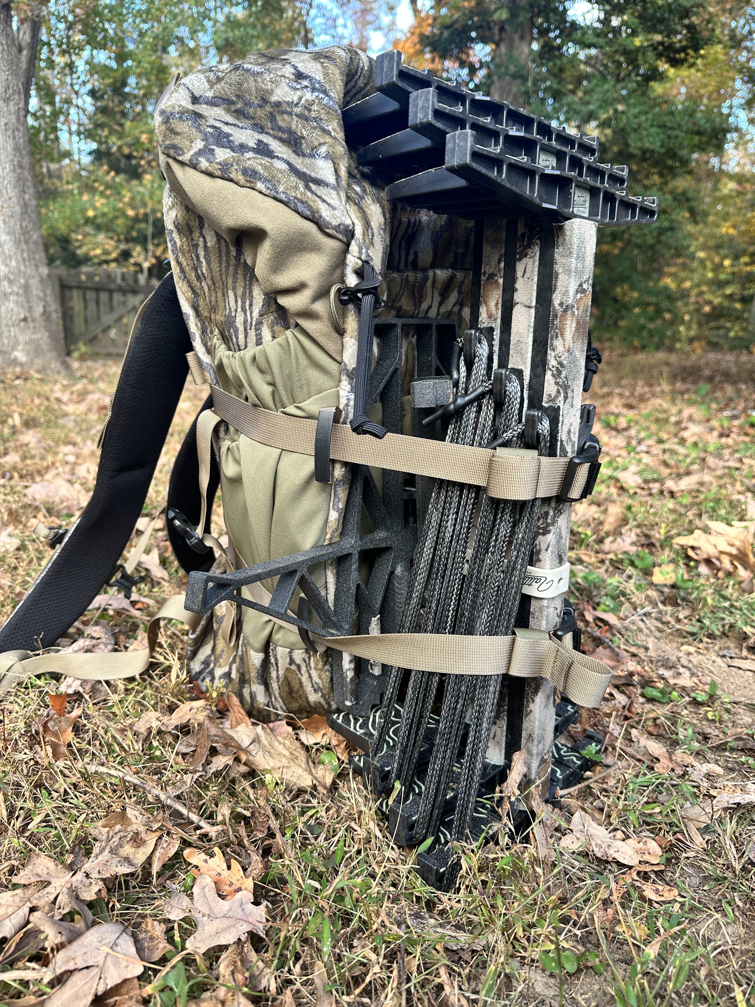 Sticks and platform strapped to a Mystery Ranch Treehouse 