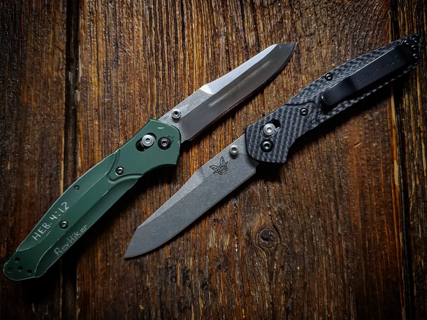 Two knives on a wooden table