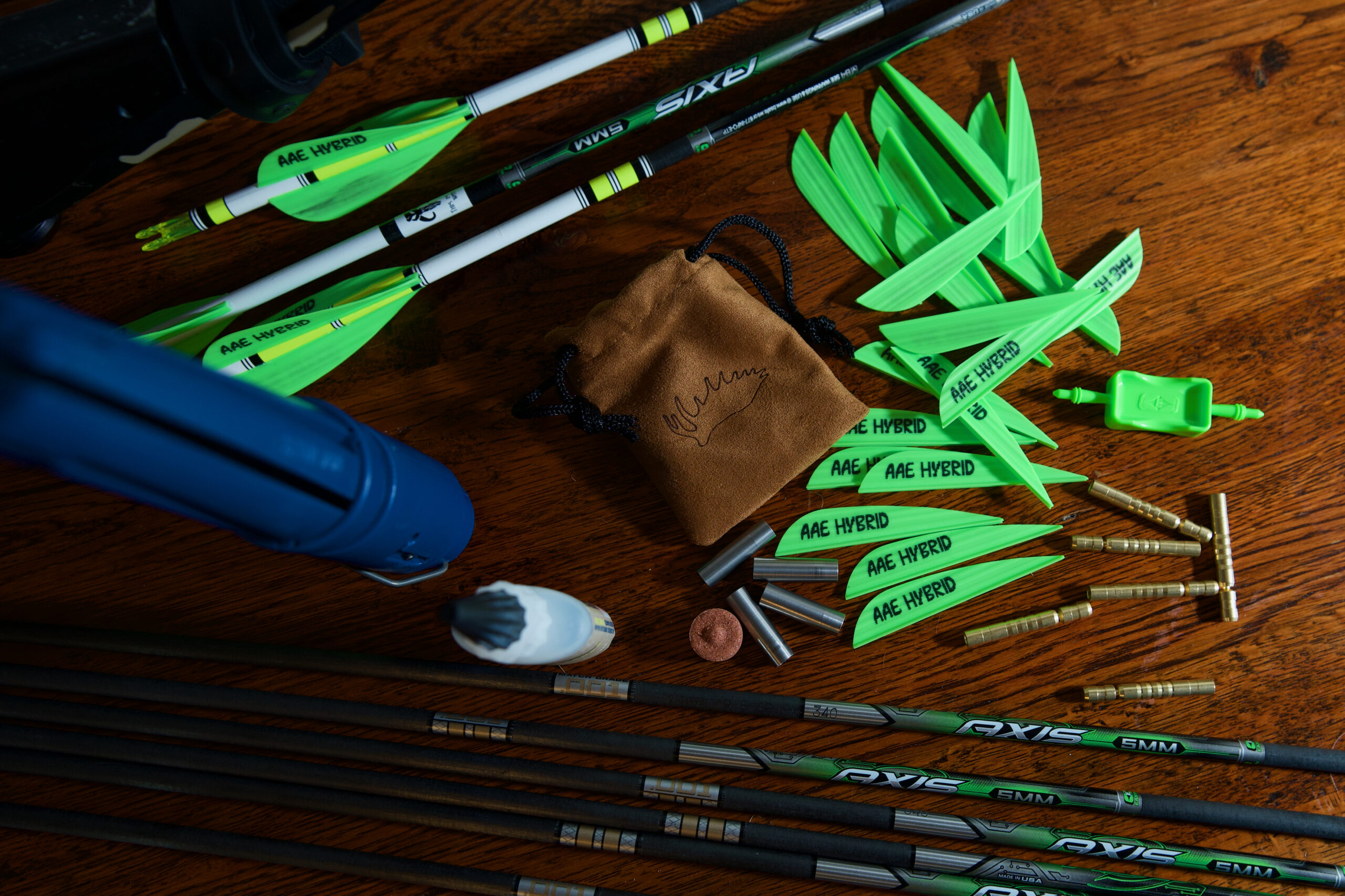 Arrow components laid out on a table.