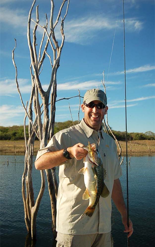 A man holding a bass