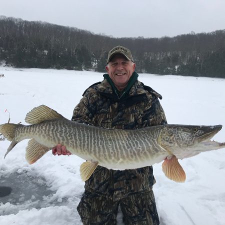 Ice fisherman reels in massive 31-pound northern pike in North Idaho,  photos show - East Idaho News