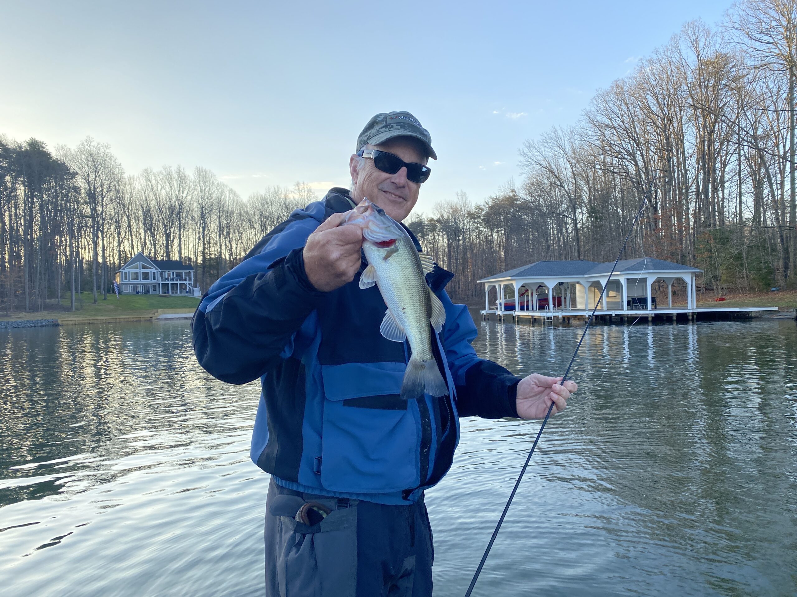 Angler holding bass