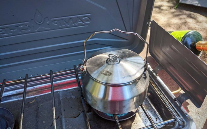  A solid camping kettle is a great addition to your outdoor kitchen setup.