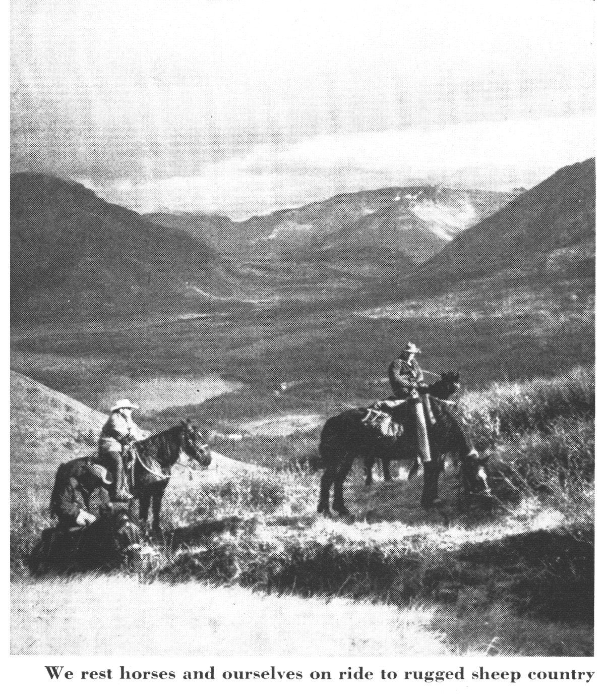 An old photo of two hunters on horseback.