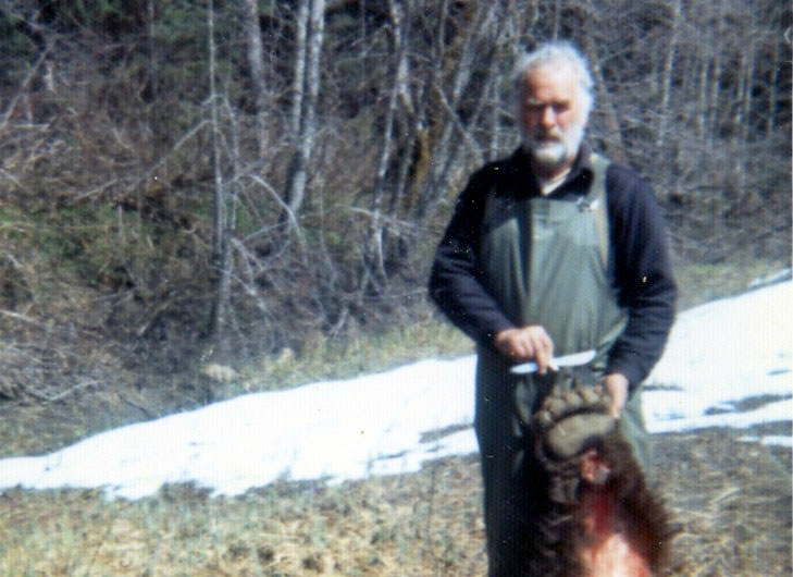 Skinning a brown bear.