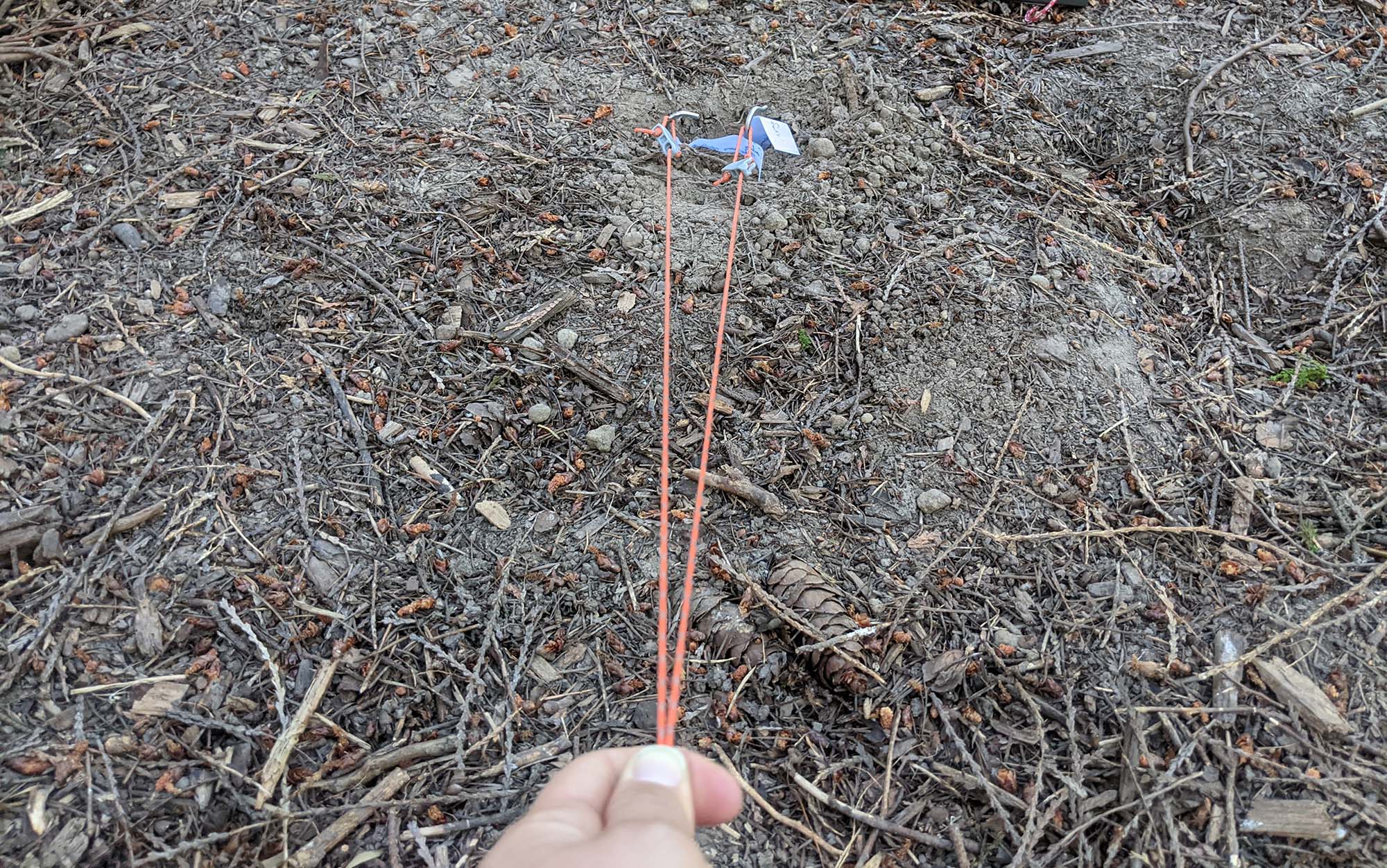 Pulling on two shepherd’s hook stakes during the first stage of testing.