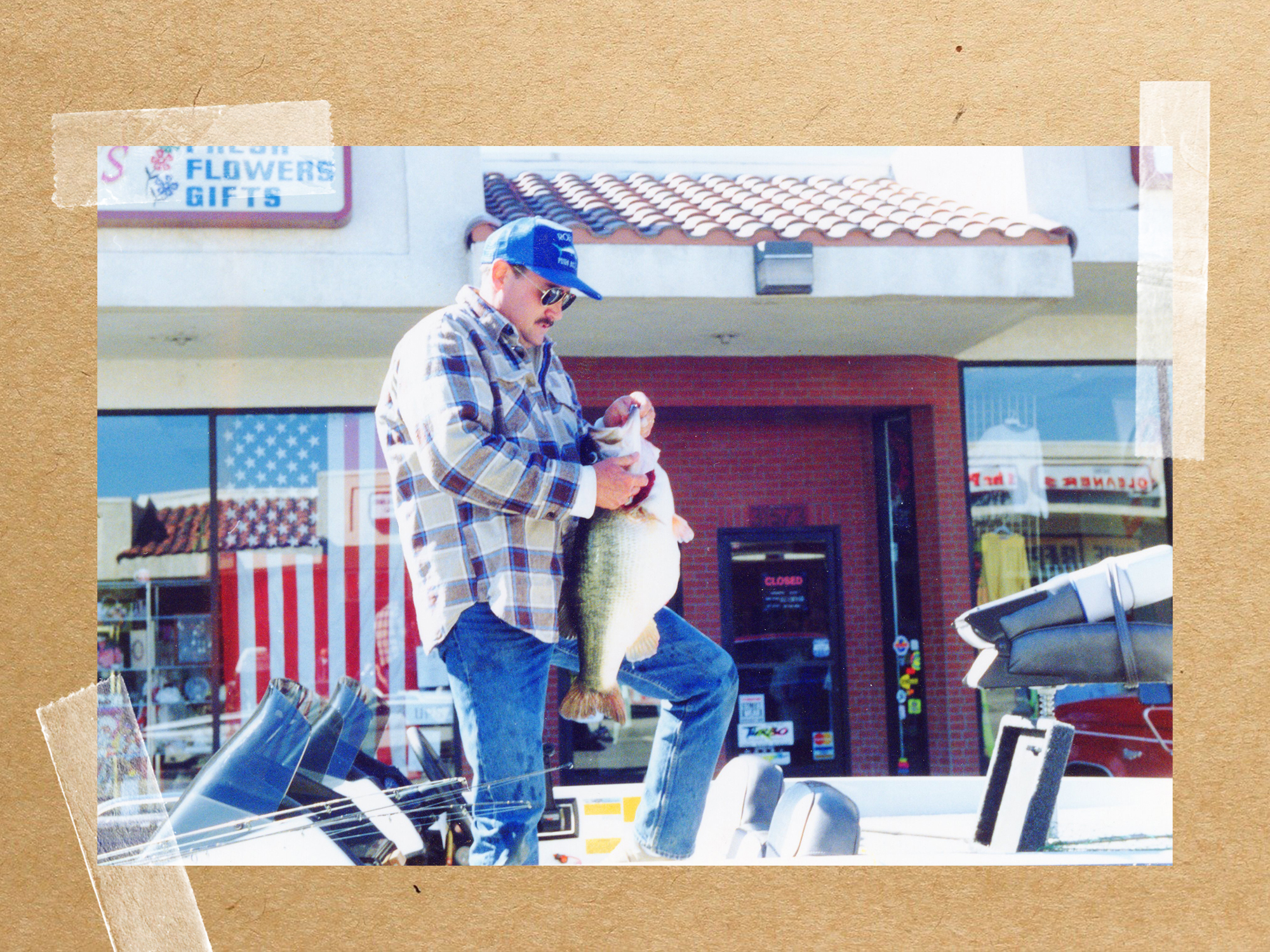 man holding record bass