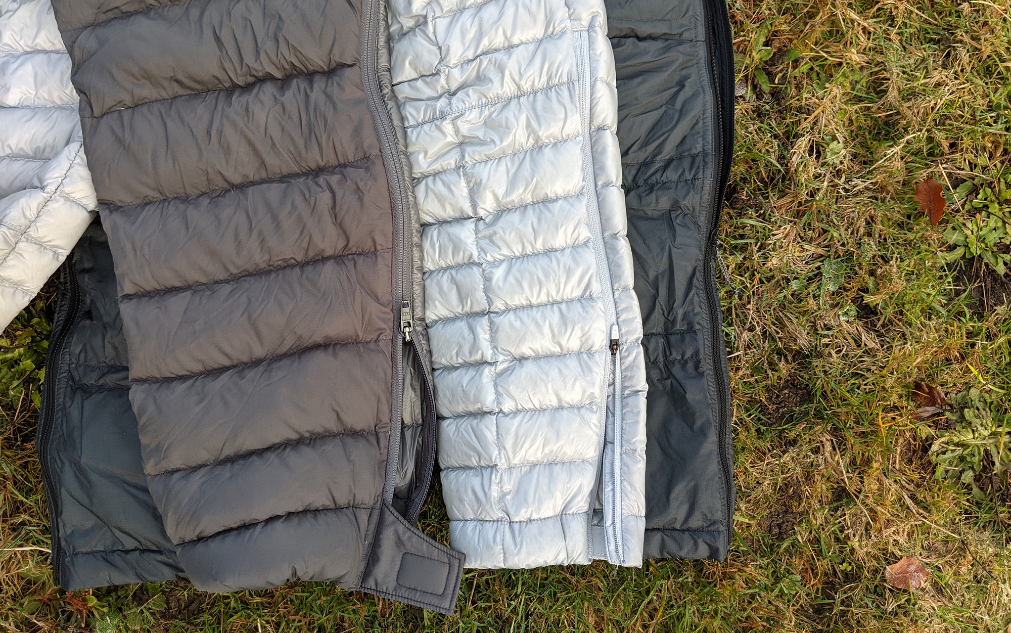 The Stone Glacier Grumman (left) had a two-way side zip, which made it easier to take off than either the Mountain Hardwear Ghost Whisperer Pant (center), which had a zip that ran from the hem up to the mid-calf or the KUIU Super Down ULTRA Pant (right) which had a one-way zip that runs down from the waist.