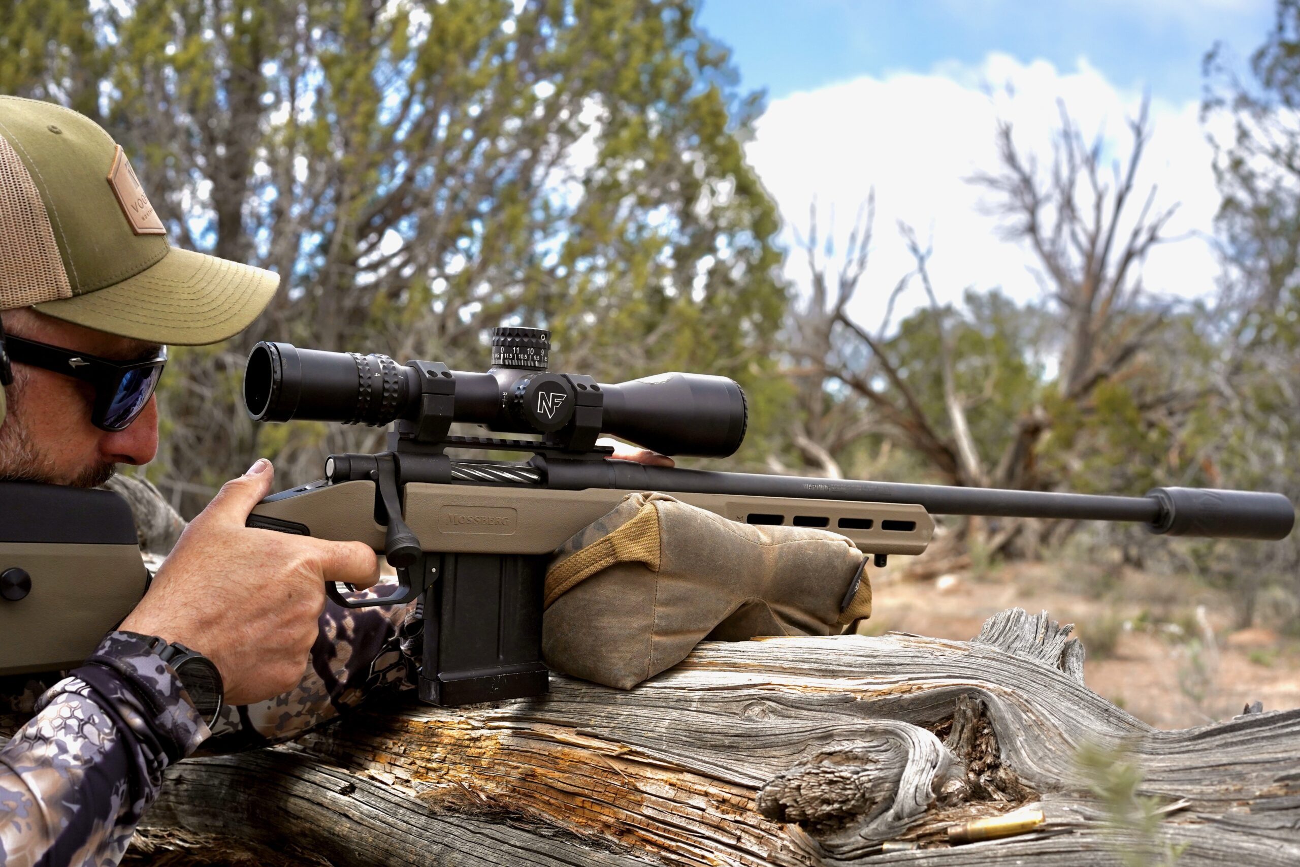 The Mossberg Patriot LR Tactical being shot off a bag.