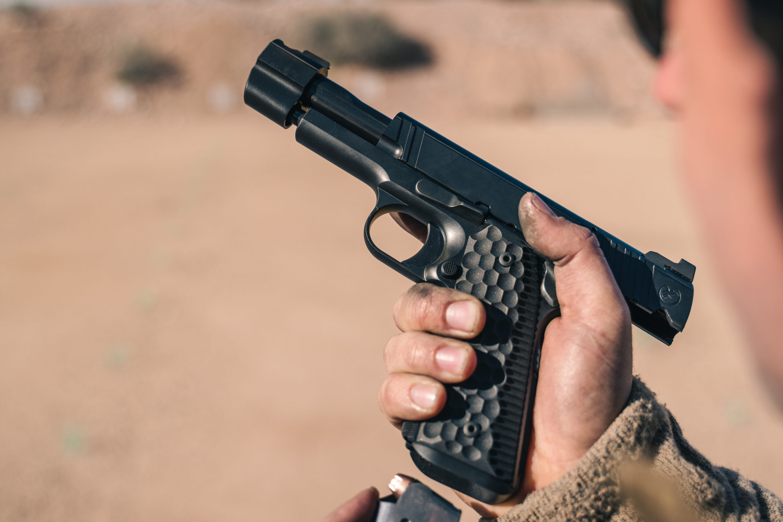 Loading a magazine into the Nighthawk Fire Hawk