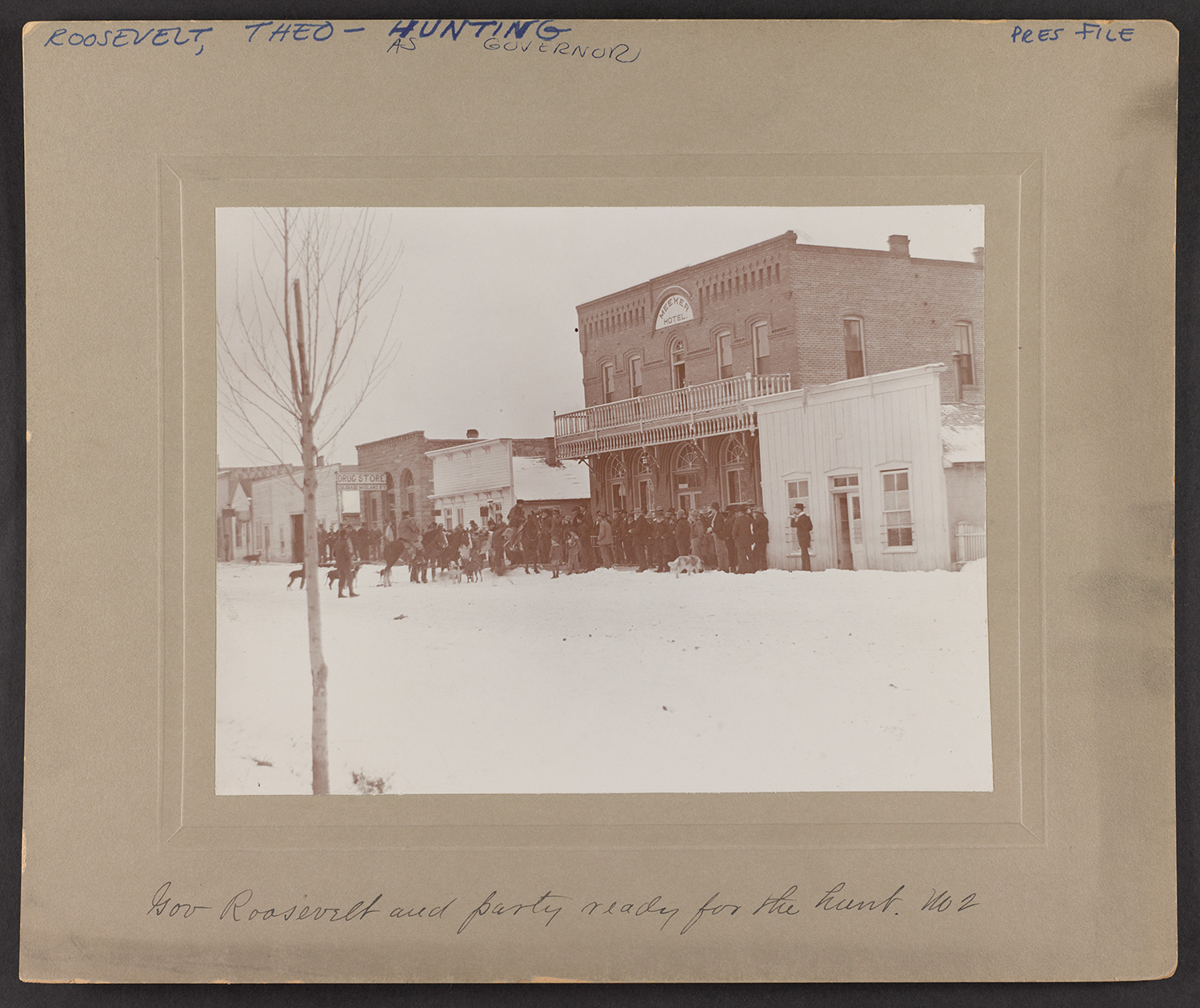 old photo of Roosevelt's hunting party in meeker colorado with notes around frame