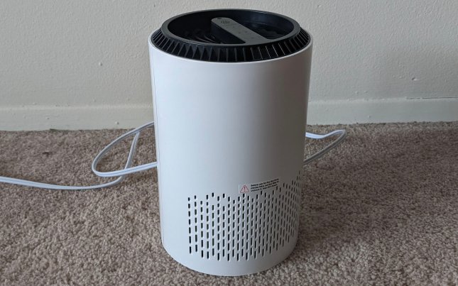 Aroeve air purifier set against a white wall