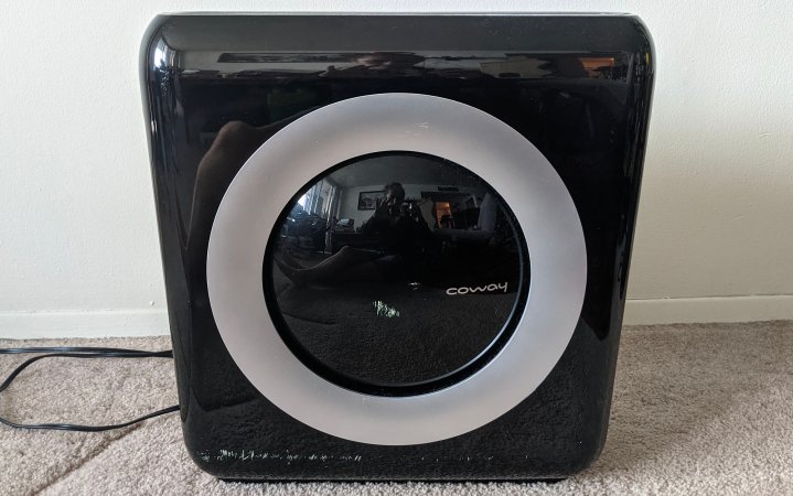  Coway air purifier against a white wall