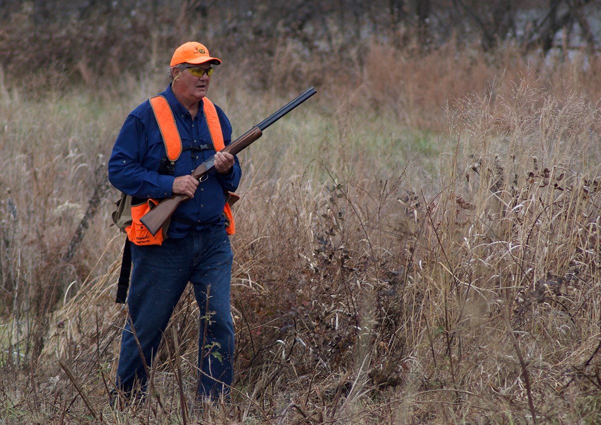 Author walks with Browning Citori shotgun.