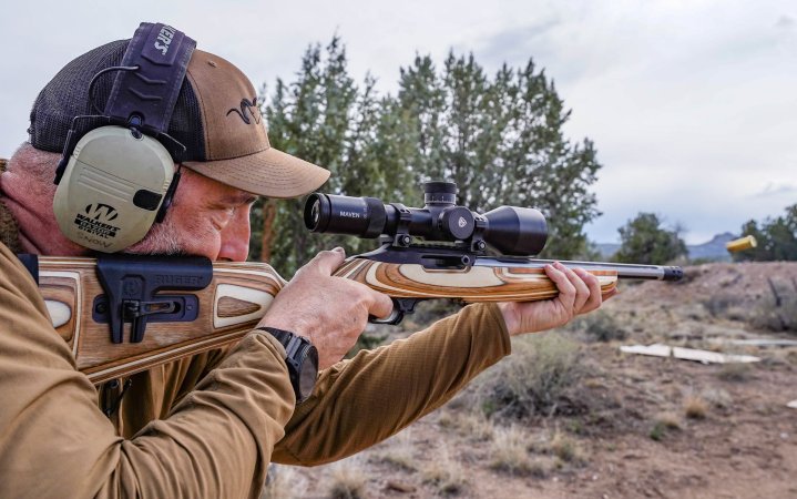 John B. Snow testes the reliability of a 10/22 .22 rifle.