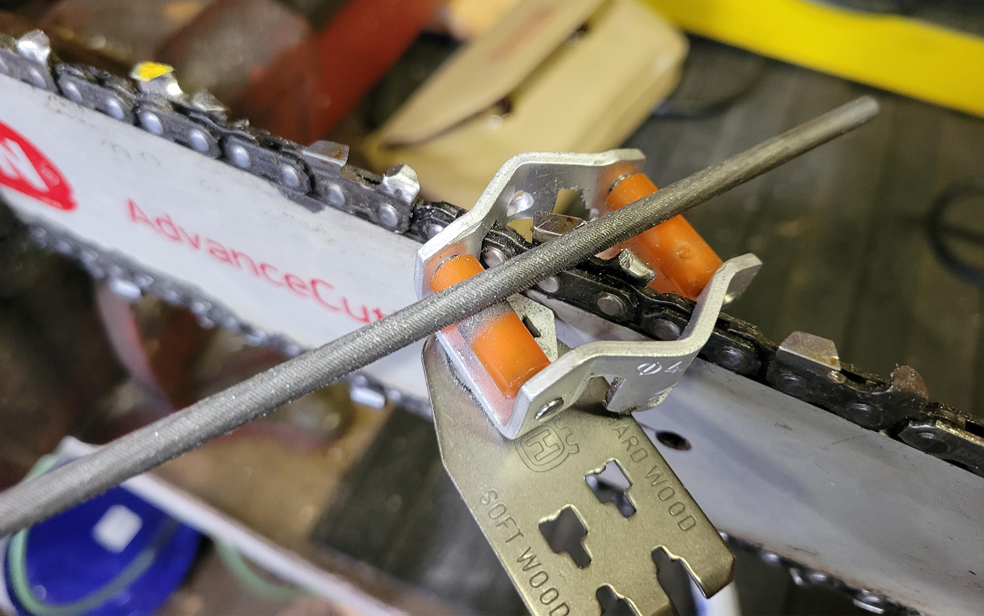 Author tests Husqvarna chainsaw sharpener.