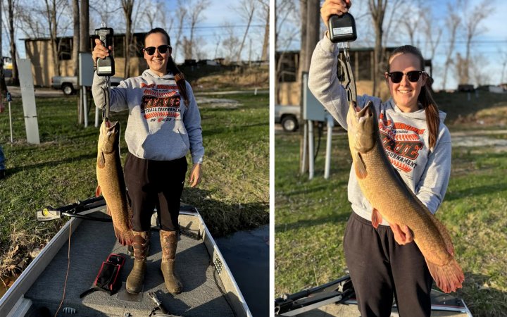 A West Virginia angler holds up the new state-record bowfin.