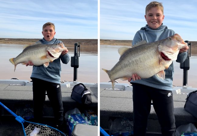 A young angler holds up a huge Texas largemouth.