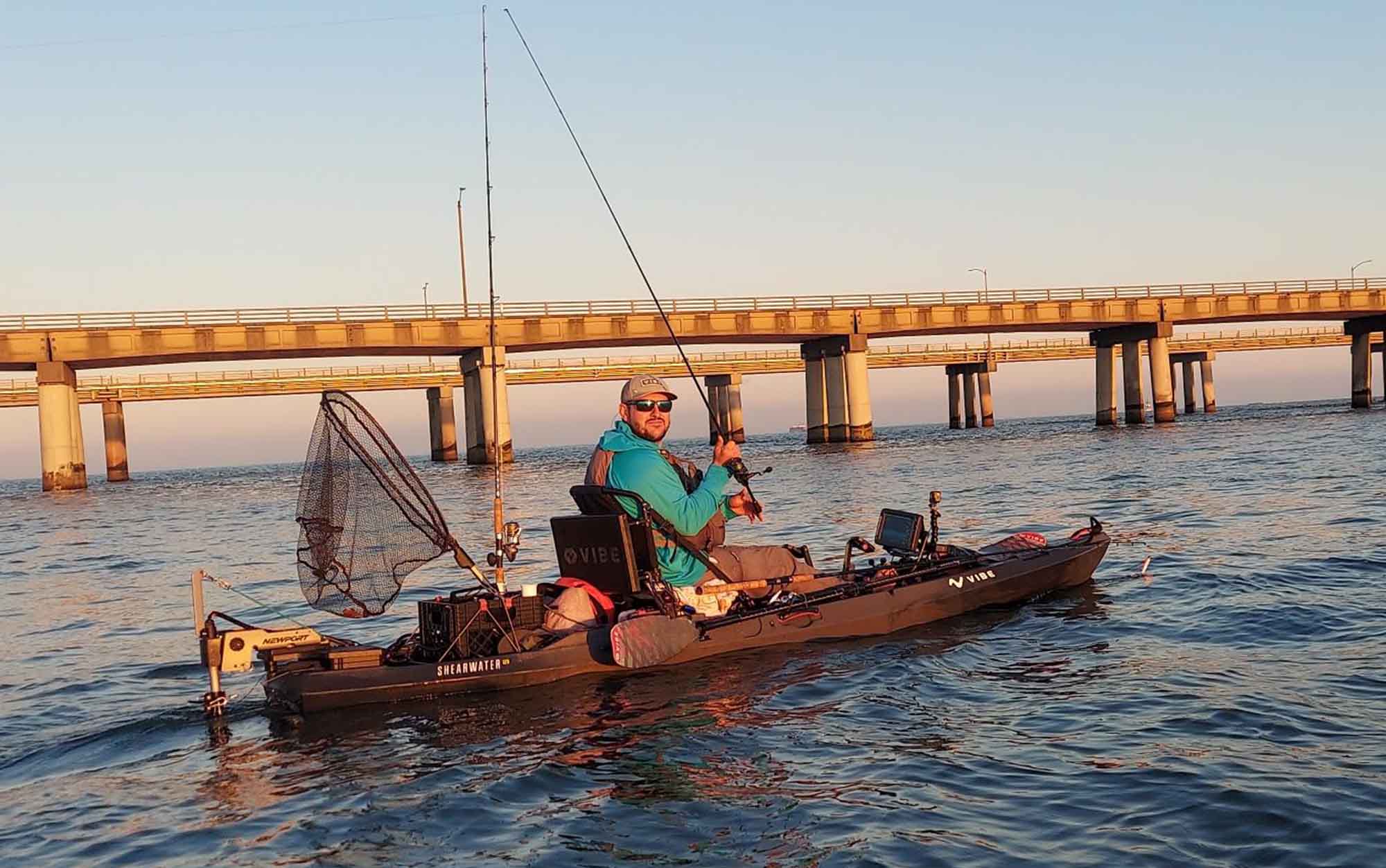 Author sits on kayak mounted with the NK300.