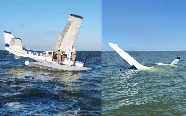 Anglers evacuate a float plane that crashed near the Chandeleur Islands.