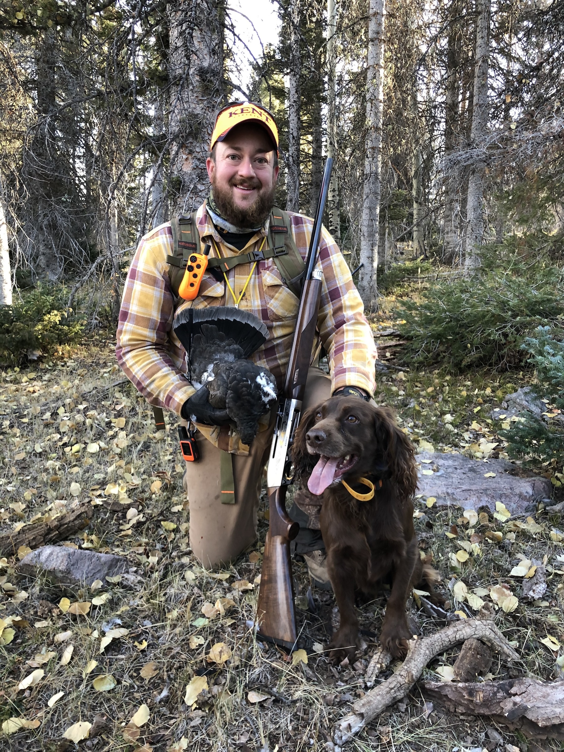 A hunter with his English cocker