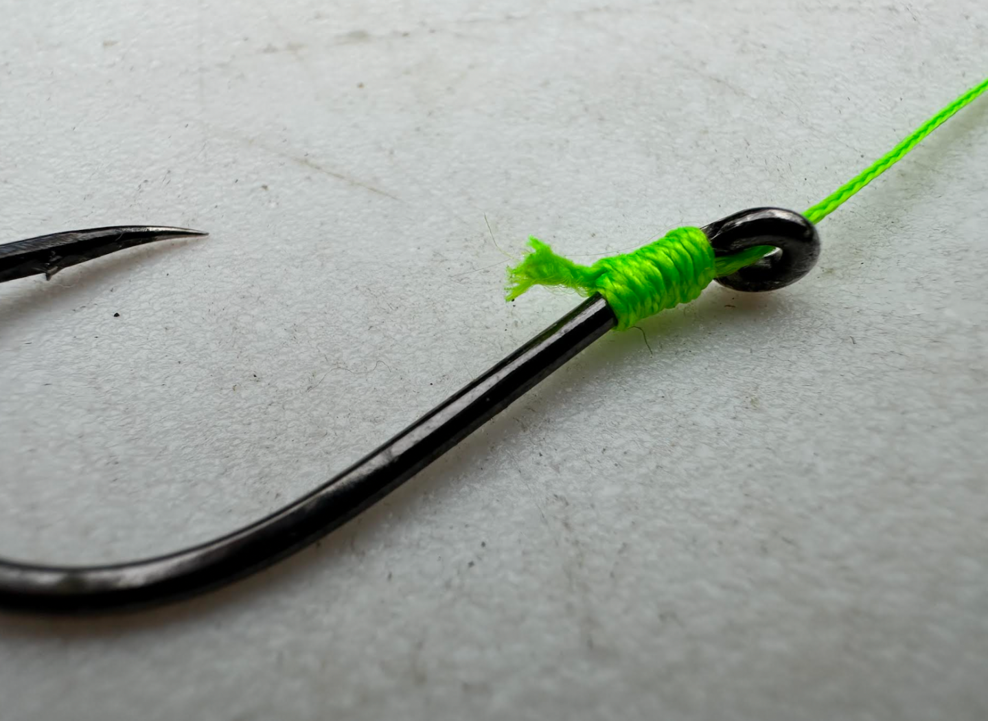 How to Tie a Snell Knot: Step-By-Step Guide With Photos and Video ...