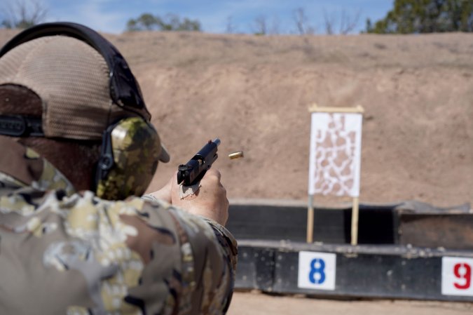 Freel fires a handgun