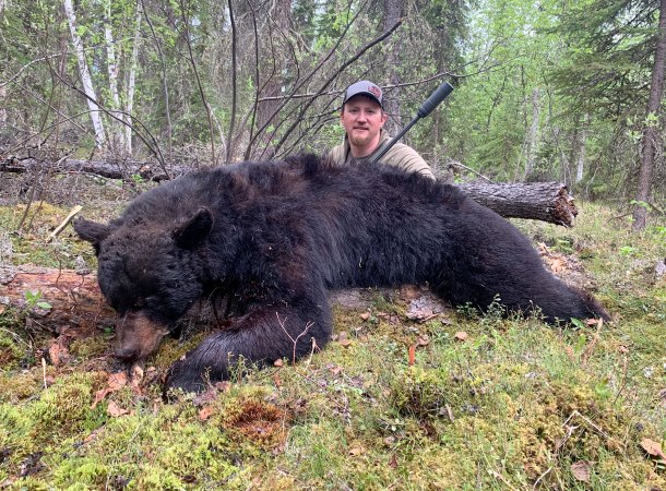 Freel with large black bear taken with 6.5 Creedmoor