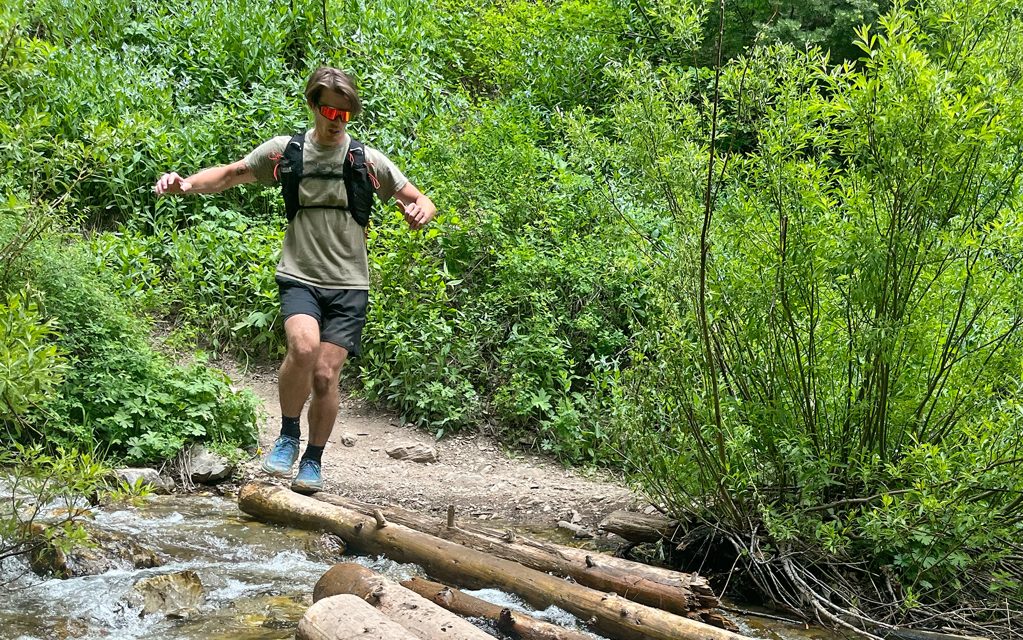 Runner crosses stream in the Apex Pro.