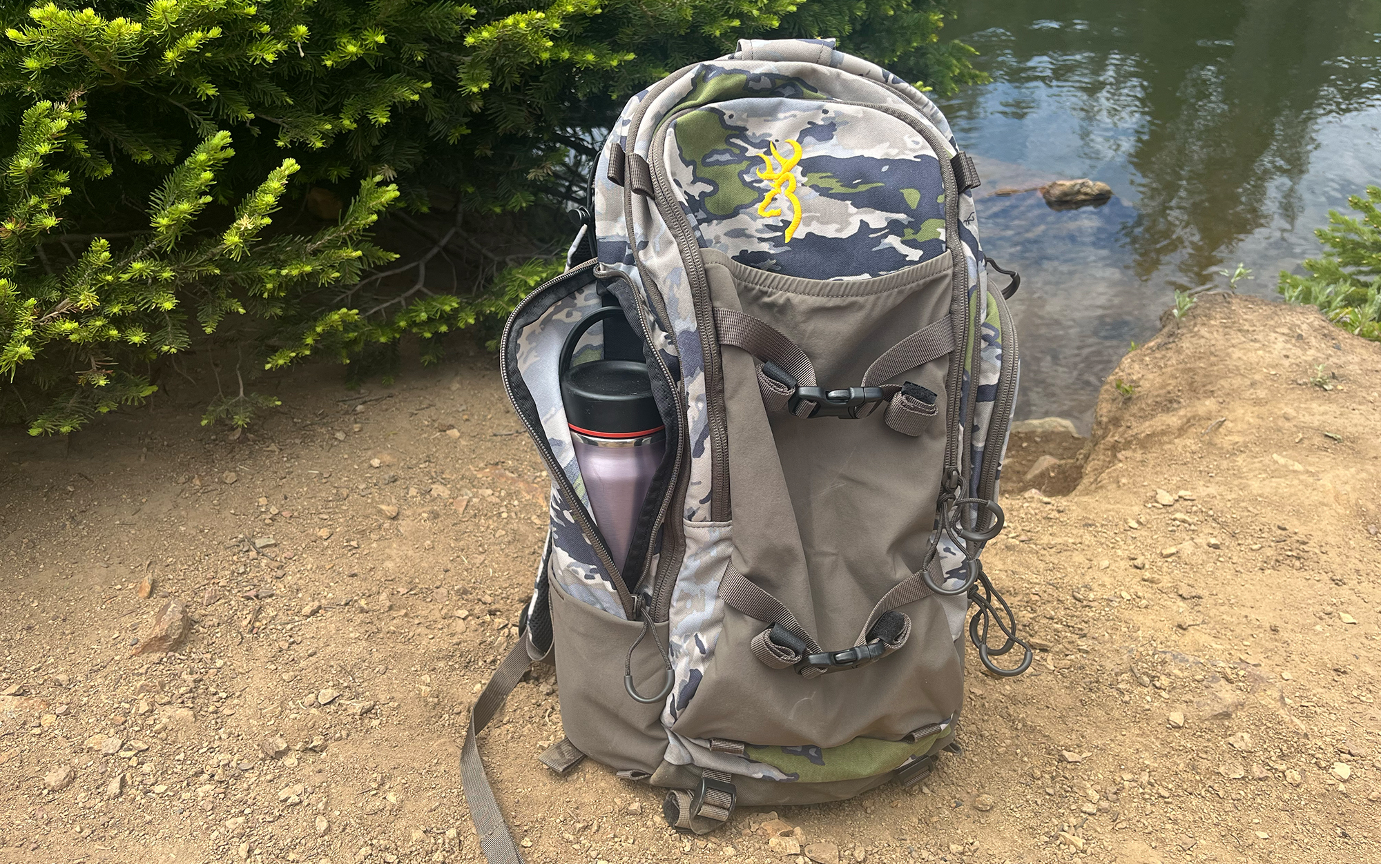 The Browning Whitetail 1300 sits near a lake.