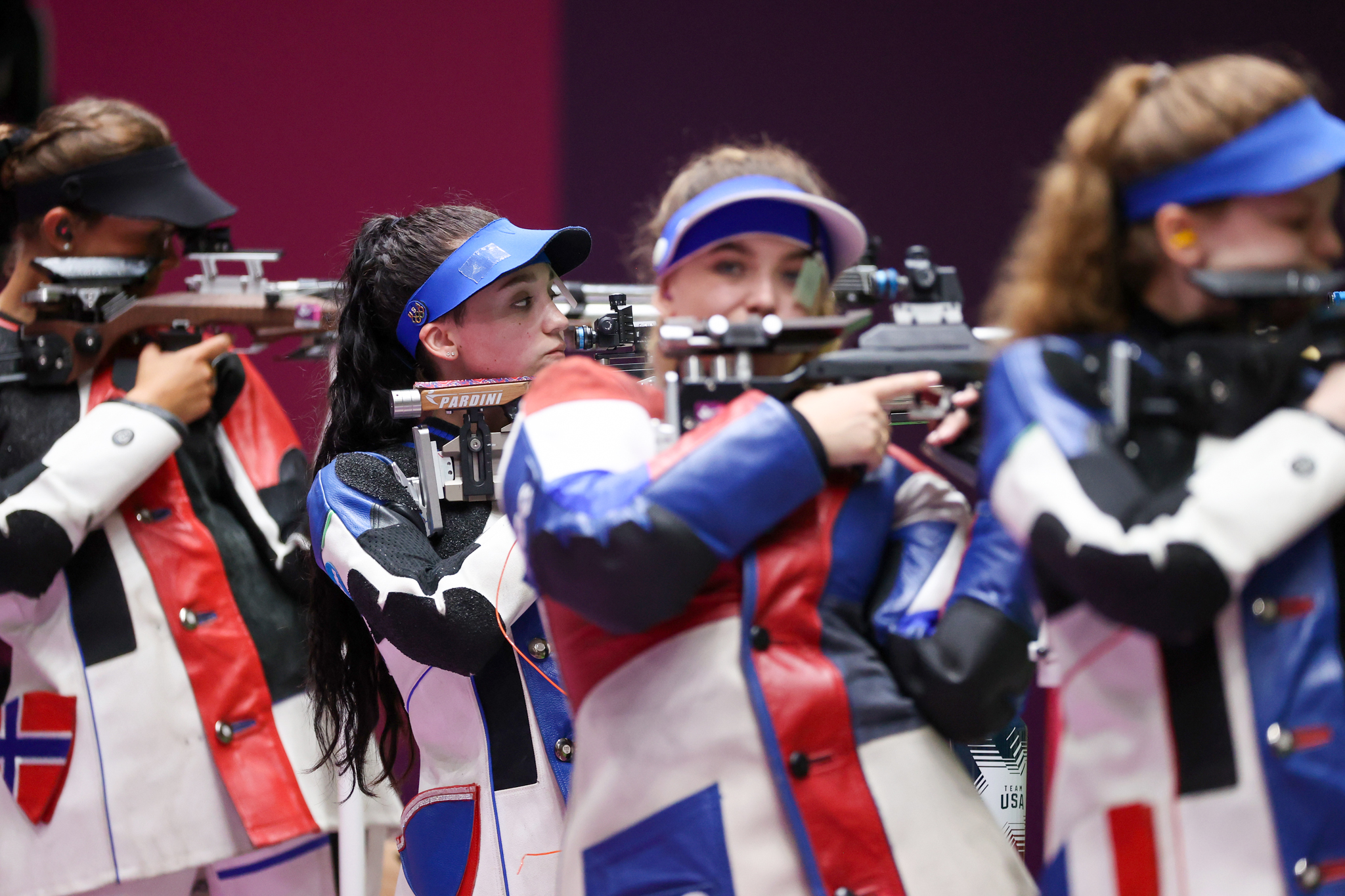 Mary Tucker shooting air rifle in Japan.