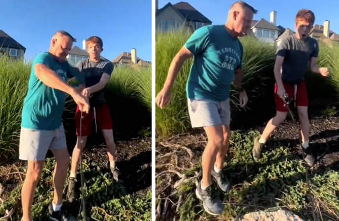 A man snaps a young angler's fishing rod in half.