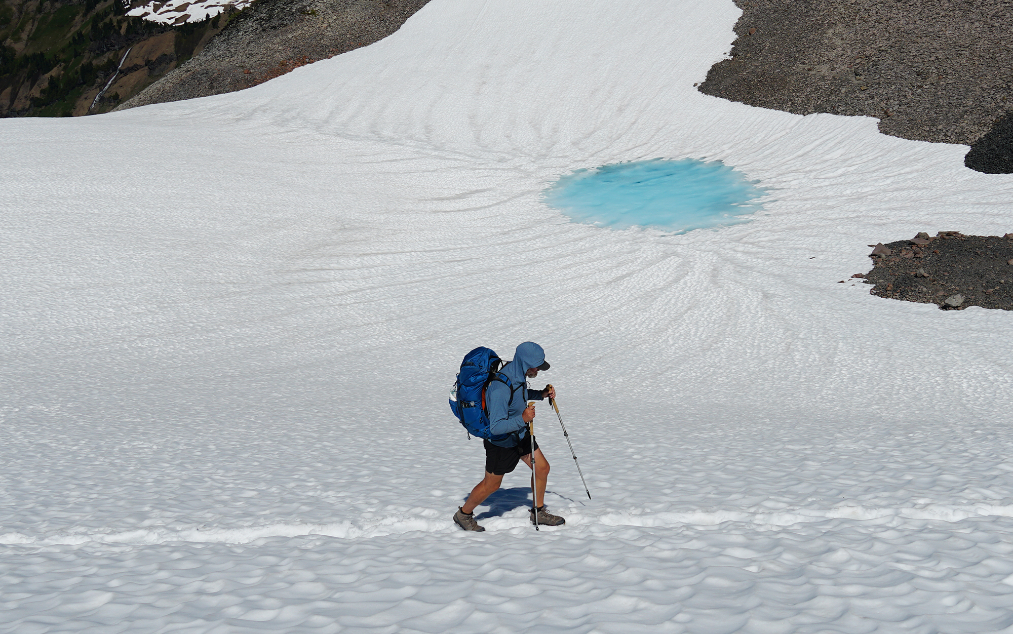 Tester traverses snowfield.