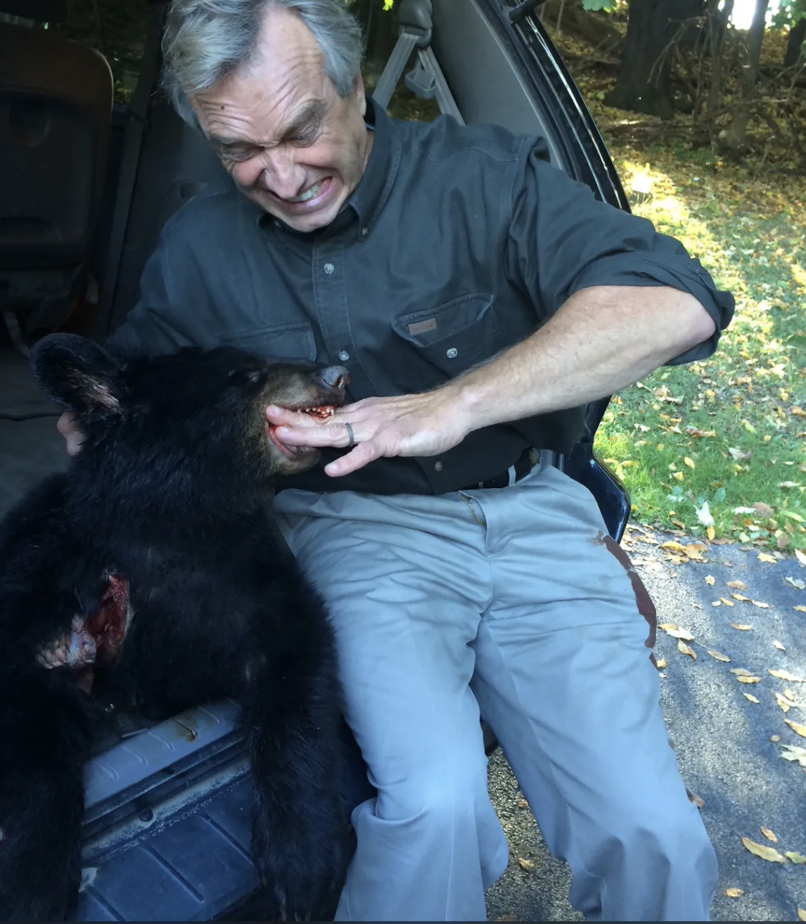 RFK J with the dead black bear cub in 2014.