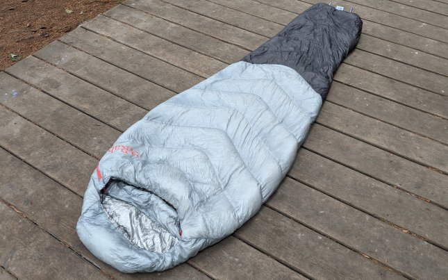 Rab Mythic sleeping bag on wooden platform