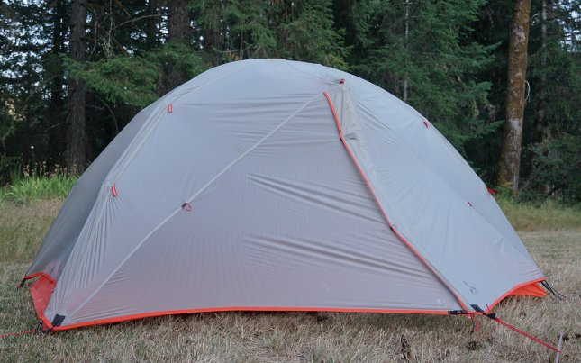 Slingfin 2-person tent set up in a grassy field