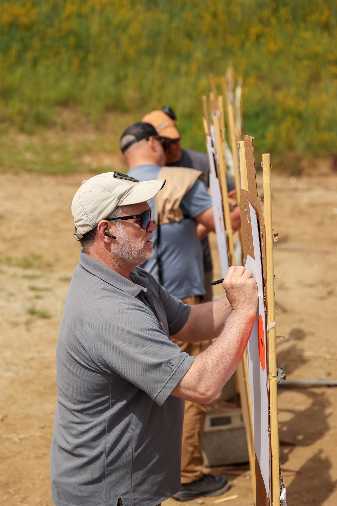 Marking targets at the shotgun slug range.